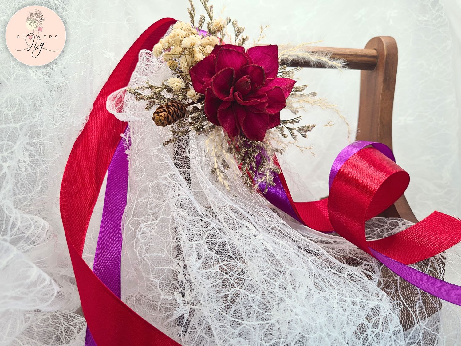 Discover the timeless elegance of our Handcrafted Sola Wood Fuchsia Dahlia Corsage/Boutonniere Set. Meticulously crafted with attention to detail, featuring vibrant caspia, delicate gypsophila, and charming dried leaves for a natural look