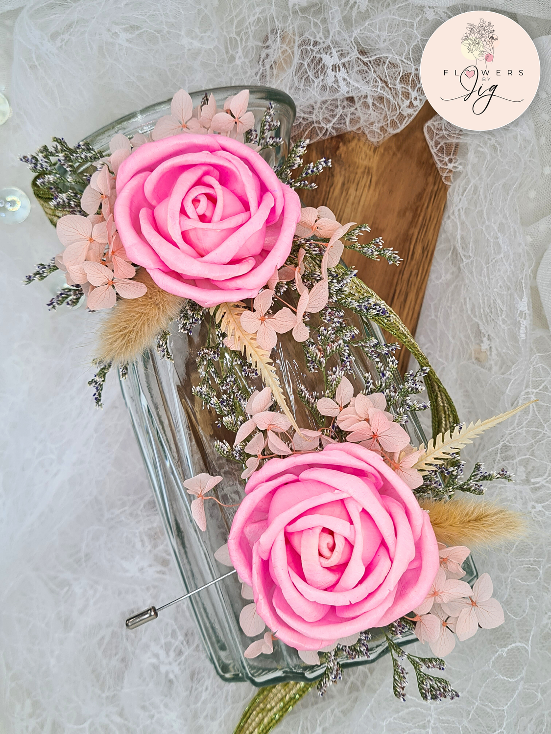 Pink sola wood rose wrist corsage and boutonnière, featuring dried flowers like hydrangea, fern, and rabbit tail. Eco-friendly, long-lasting, customizable colors and ribbon. Perfect for weddings and bridal parties.