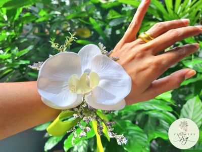Fun-filled White Orchid Corsage &amp; Boutonnière ensemble, crafted with attention to detail for Tropical or Beach Weddings. Vibrant lime green Satin Ribbon complements the Realistic Polyester Orchid, making it a unique and eye-catching accessory