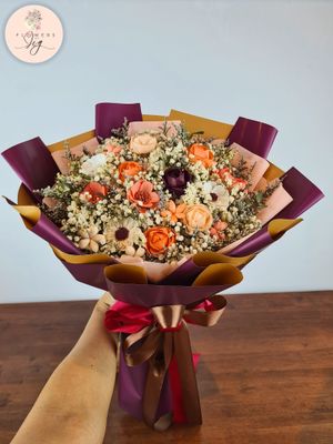 Celebrate love with our handcrafted Spring Bouquet, featuring peach, rose, &amp; white sola wood flowers. Perfect for weddings and special occasions, this vibrant arrangement includes daisies, jasmine, peonies, wrapped in colorful paper and satin ribbons