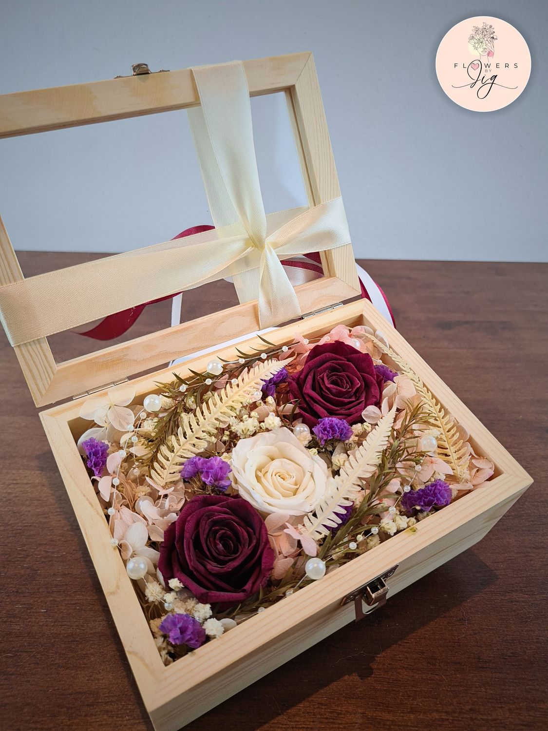 Exquisite Pinewood Box Bouquet with Dark Red and White Infinity Roses. Features assorted dried flowers and decorative pearls. Ideal for anniversaries, weddings, and birthdays. Handcrafted and long-lasting. Perfect for personalized keepsakes.