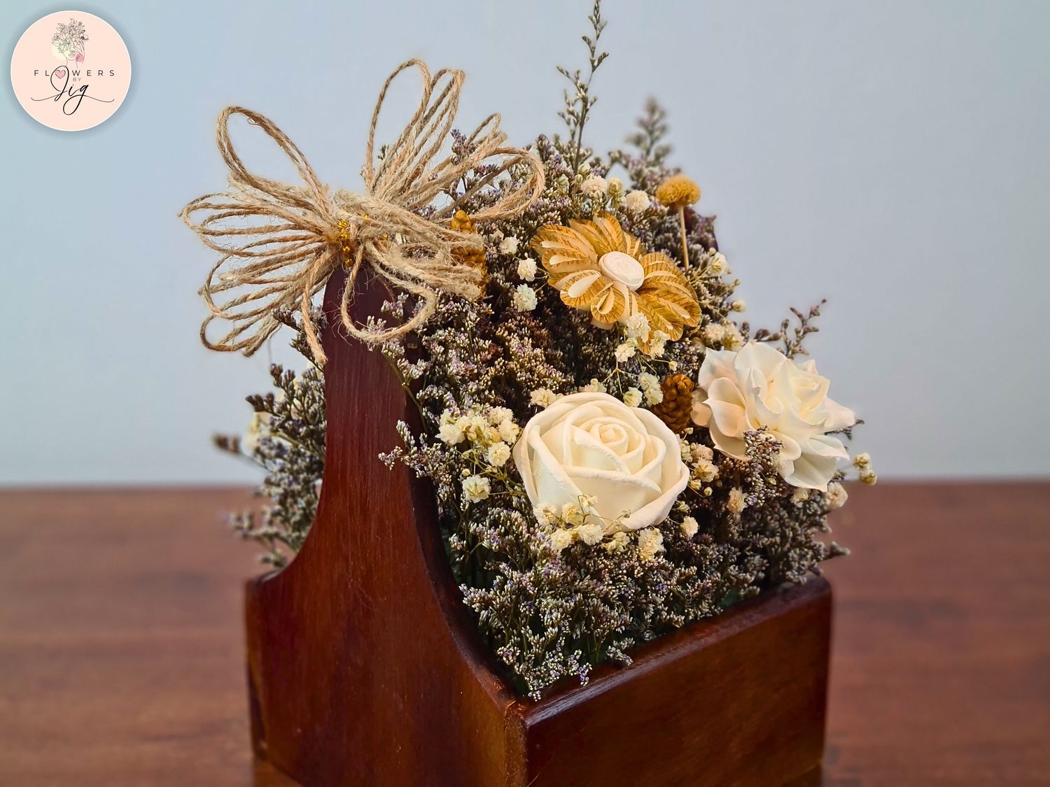 Enhance your home with our Farmhouse Floral Sola Wood Floral Box. This rustic, hand-crafted flower arrangement features dried meadow grass in a brown wooden box, perfect for adding natural elegance to any room, event, or special occasion