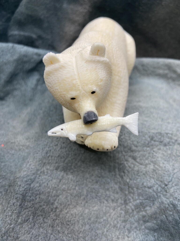 Crouching Grizzly with Fish