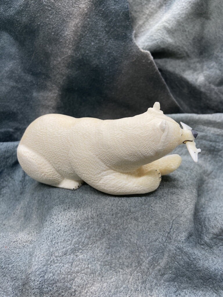 Crouching Grizzly with Fish