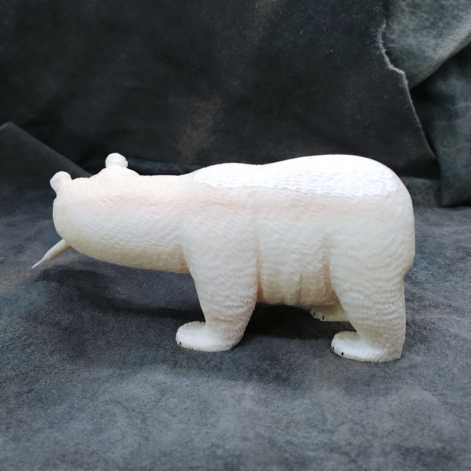 Textured Polar Bear Carrying Fish