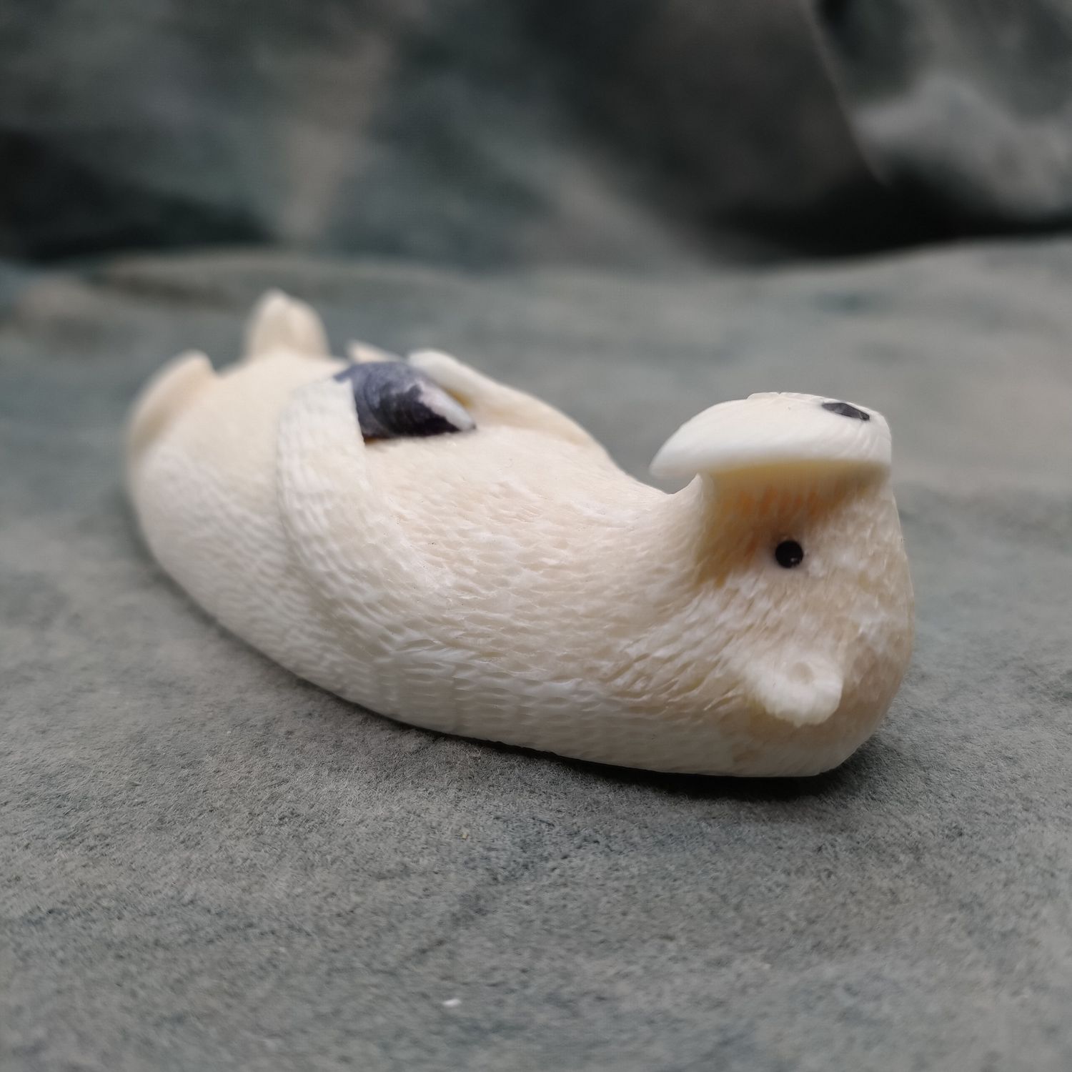 Floating Sea Otter with Mussel