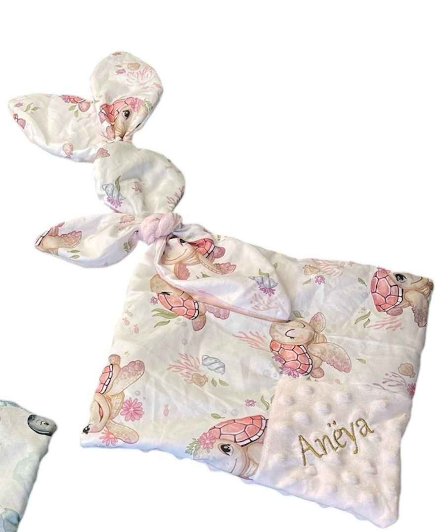 Doudou tortue rose