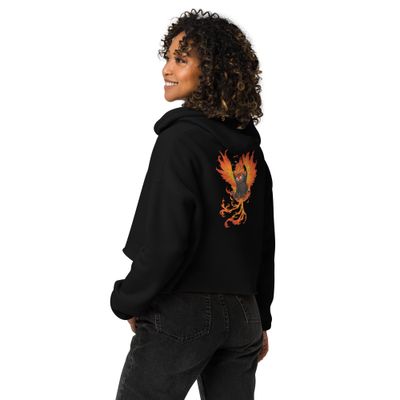 Black unisex t-shirt featuring a bold illustration of a fiery owl with flaming wings, symbolizing transformation and rebirth, by Aphodis.