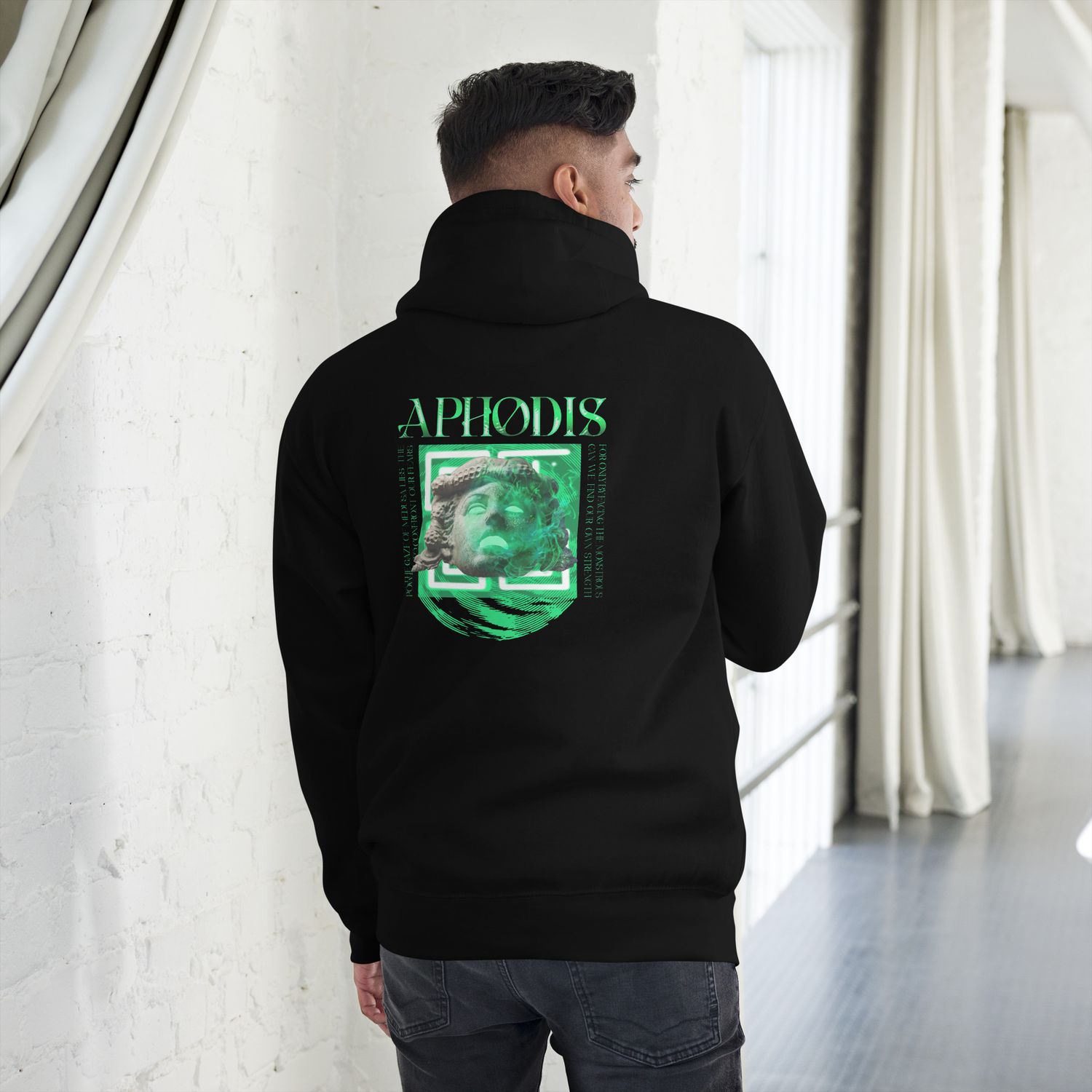 Medusa Mythology Graphic Tee with glowing green Medusa head design.