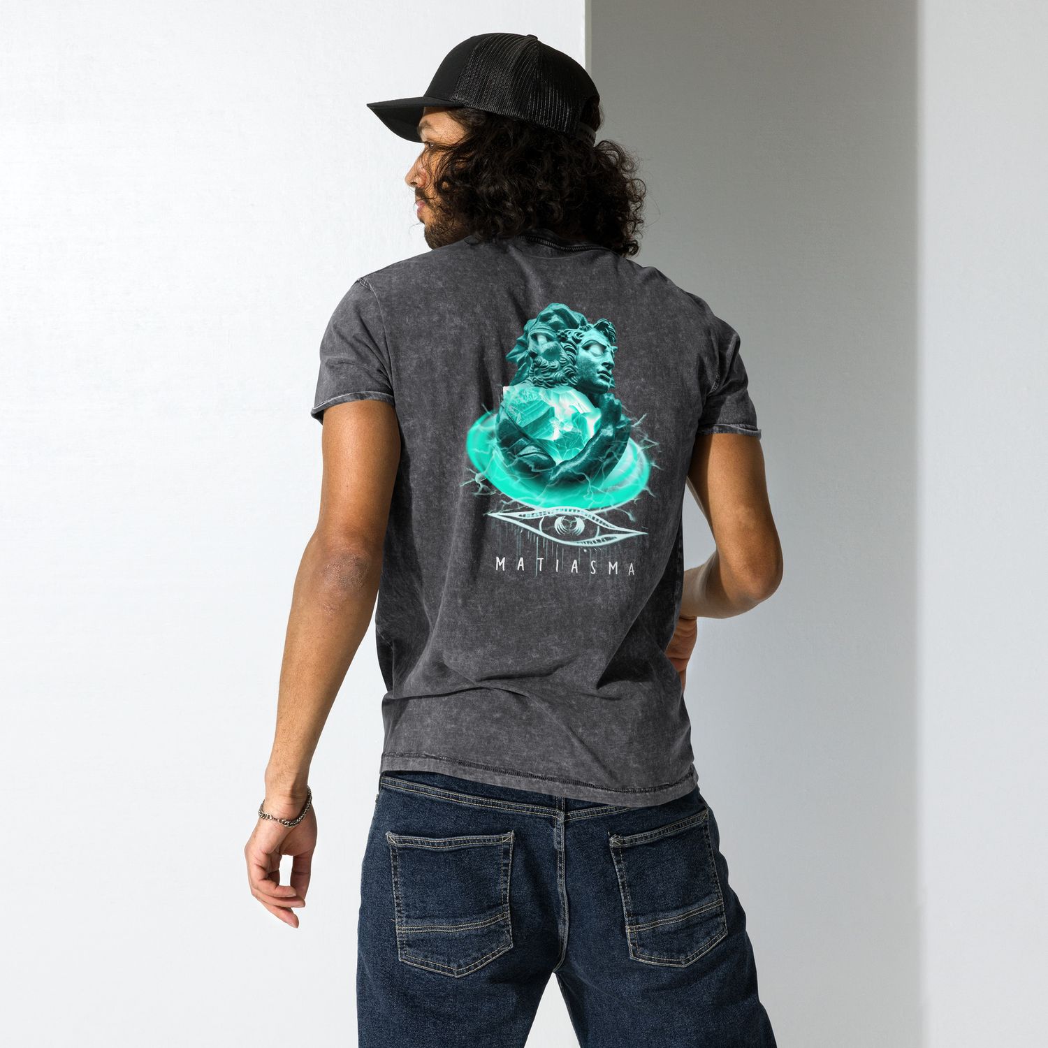 Matiasma Duality Mythos Graphic Tee with two opposing faces and an electric, crystalline design in teal, symbolizing light and shadow.