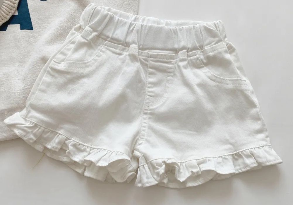White Denim Ruffle Shorts