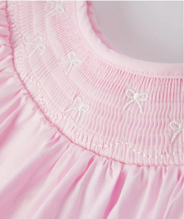 Girls Pink Smocked Embrd white bow romper