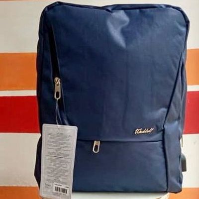 Sac à dos bleu pour ordinateur portable en tissu de pluie avec port de chargement USB