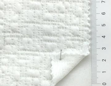 Geometric Jacquard Knit in Ivory - 50" or 127cm wide - 63%Poly, 30%Rayon,, 7% Spandex