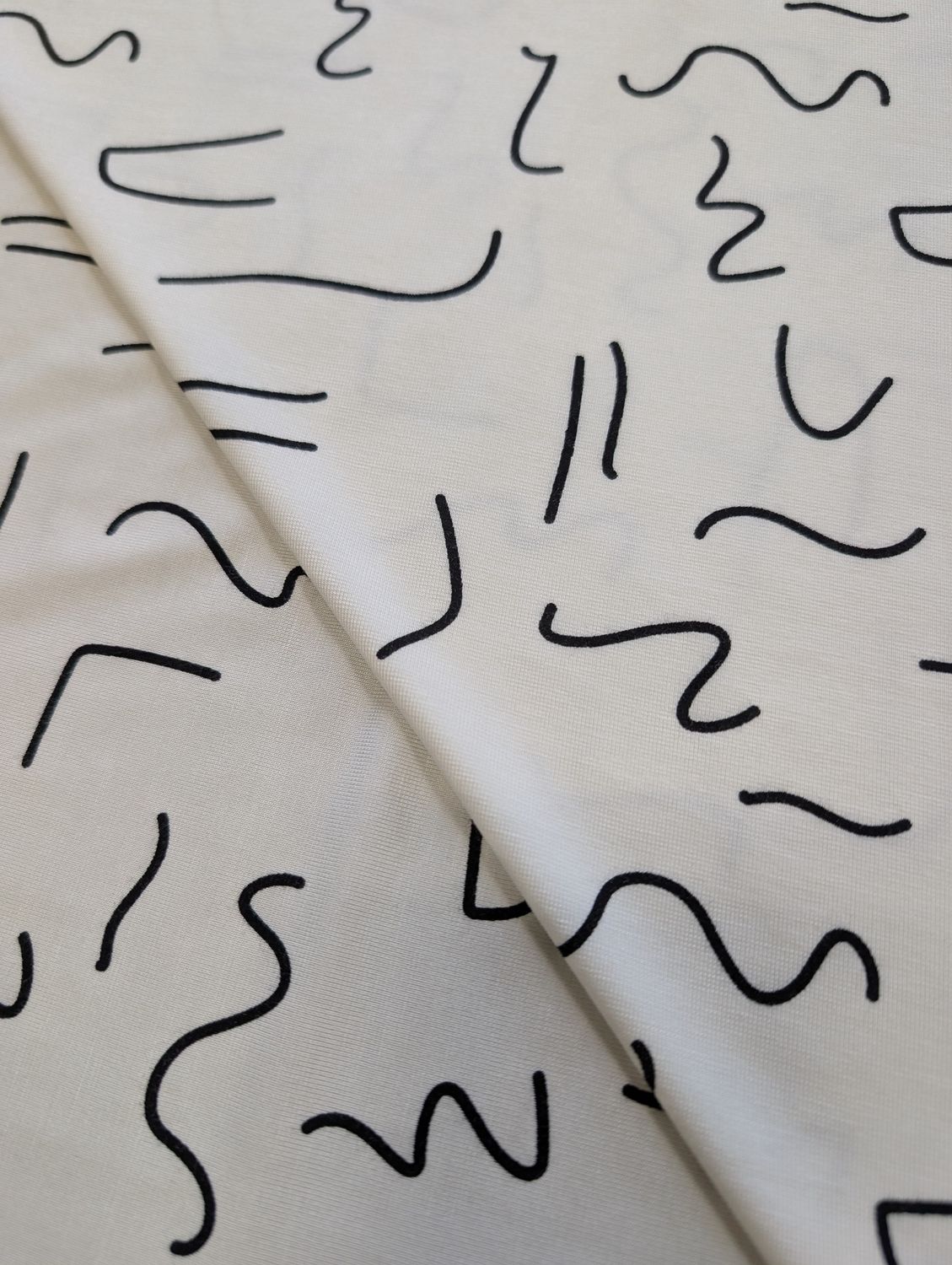 Bamboo Rayon Knit in Off-White with Black Squiggles