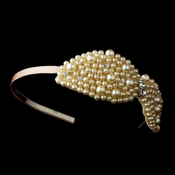 Countless champagne faux pearls and rhinestone accents.