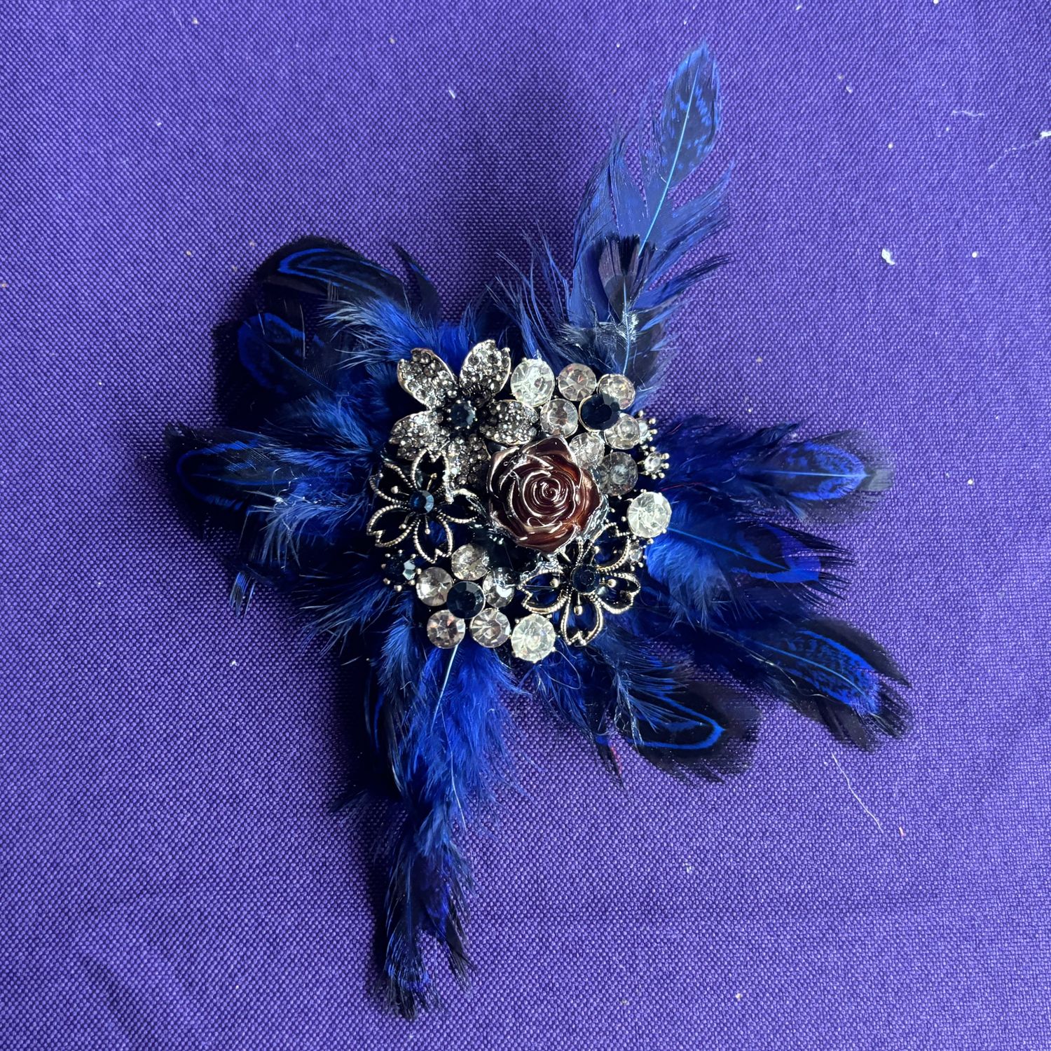 Blue feathers with silver and navy flowers