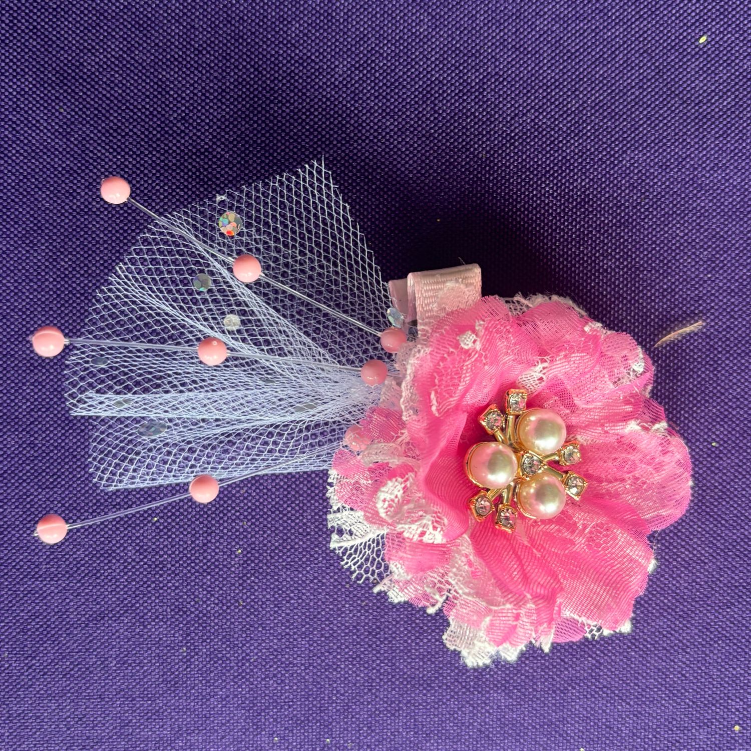 Pink flower, white tulle