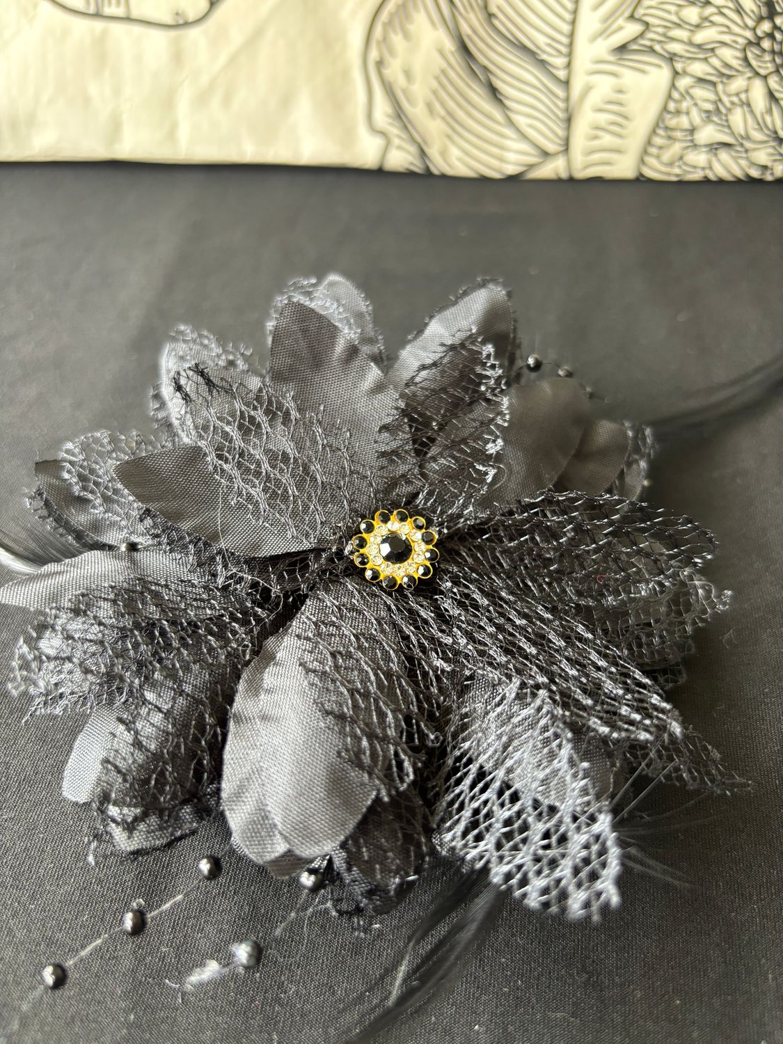 Black flower with black accents