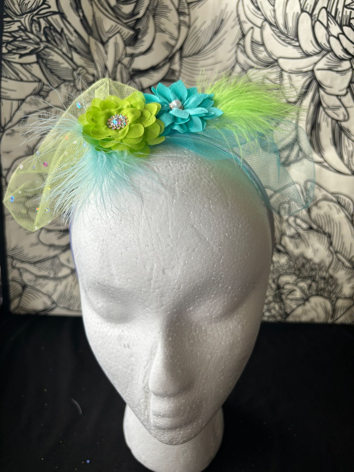 Green and indigo flowers and tulle on grey band