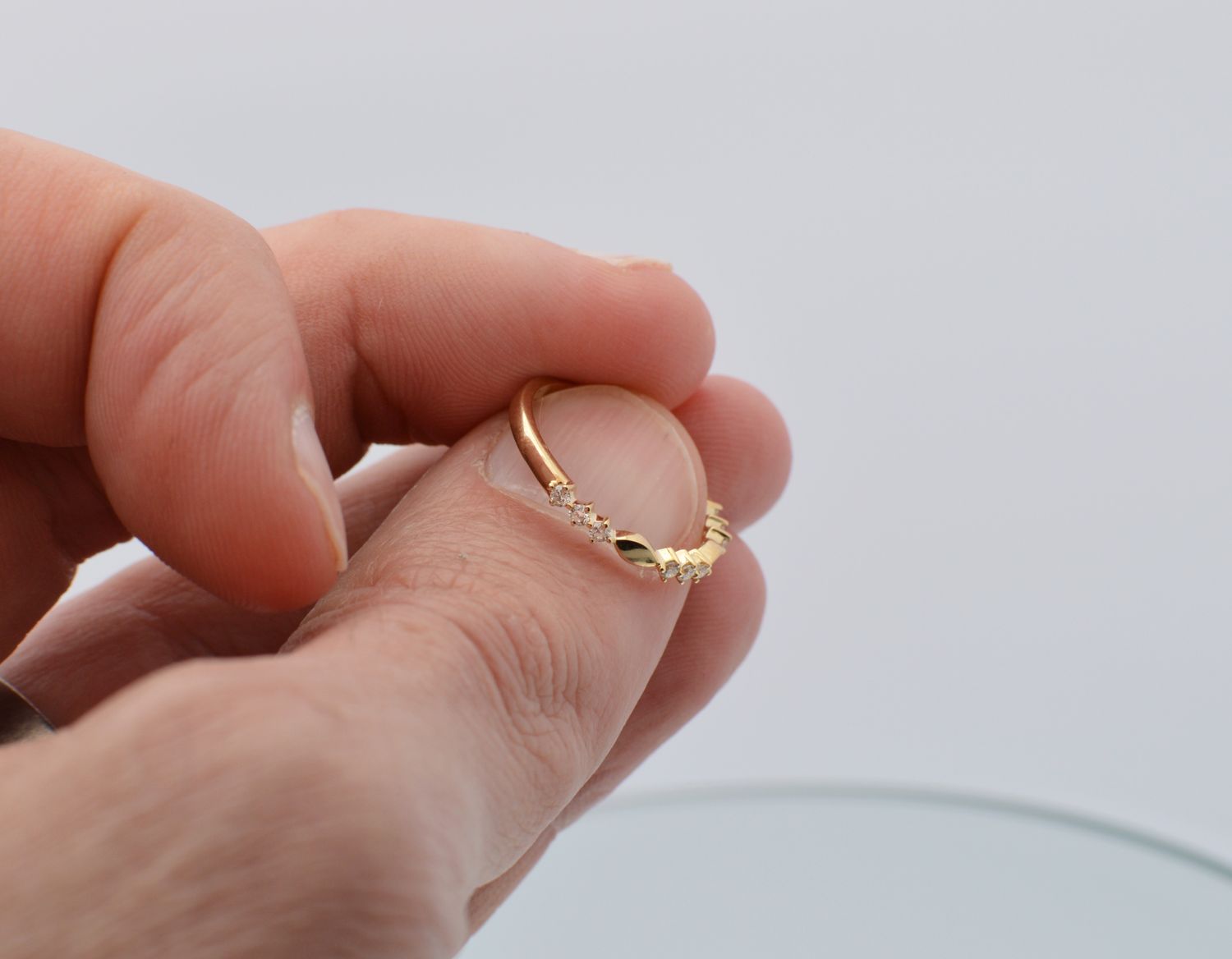10K Yellow Gold .20ctw Diamond Band Alternating 3 Diamond / Eye Shape Section