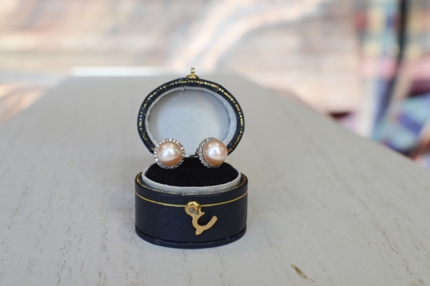 14K White Gold Peachy Pearl Studs in .20ctw Diamond Halo Jackets