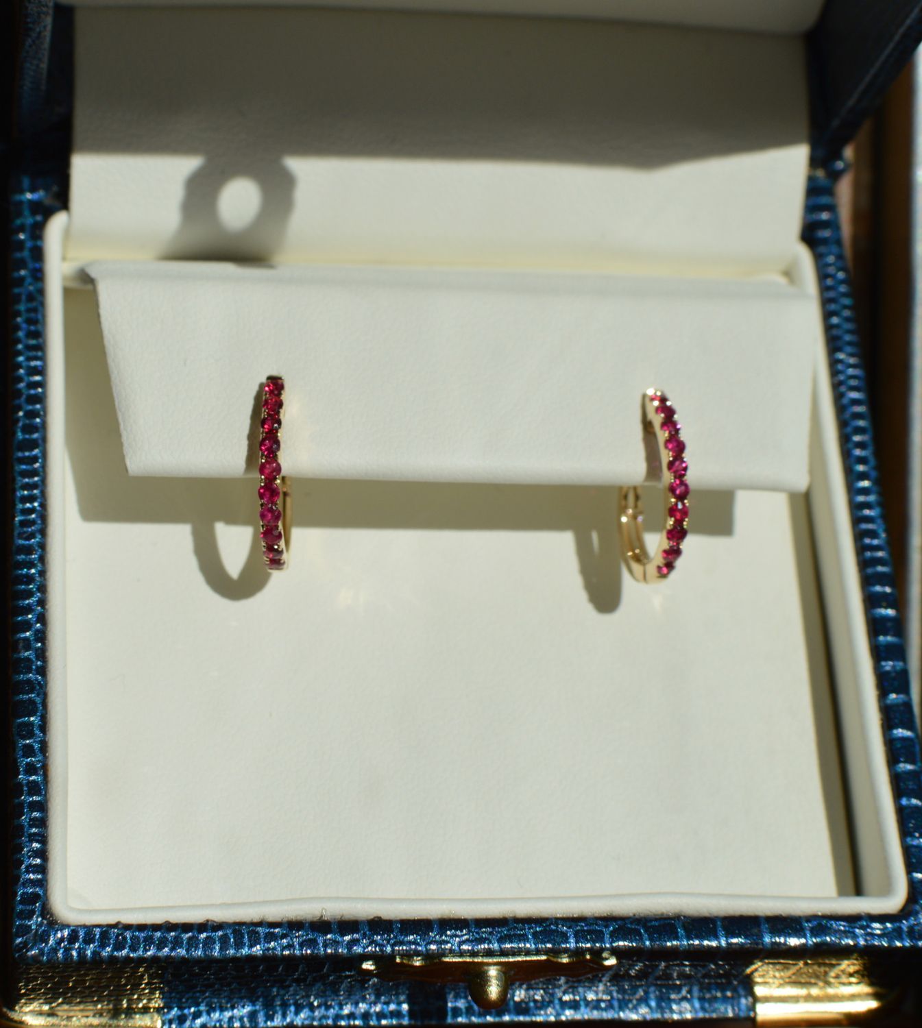 14K Yellow Gold .50ctw Ruby Oval Hinged Hoops 14x16mm