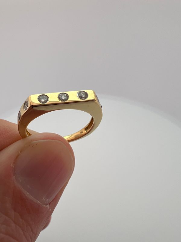 10K Yellow Gold .21ctw Flush Set Diamond Band