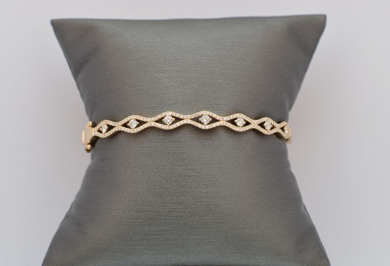 14K Yellow Gold .77ctw Diamond Wavy Hinged Bangle