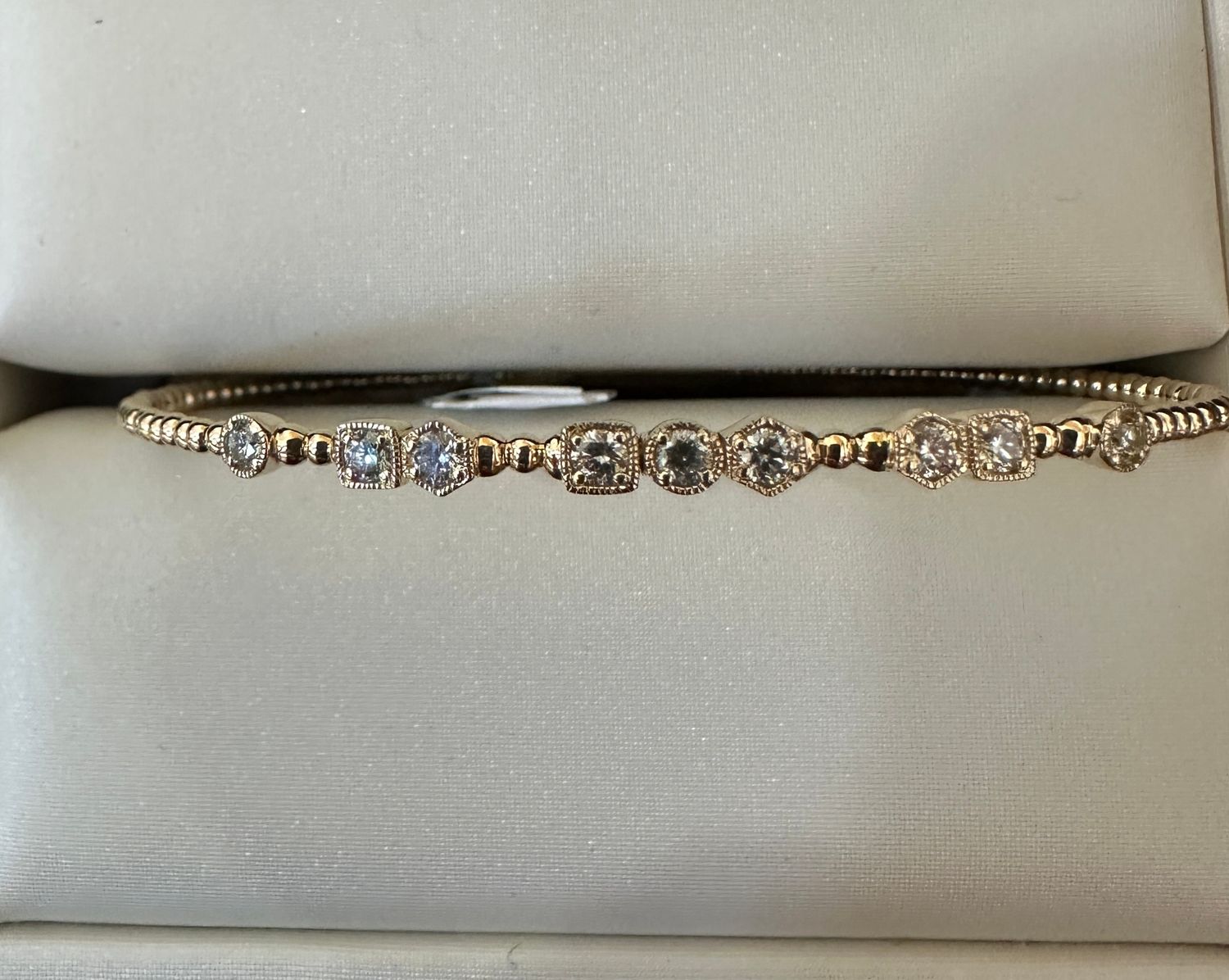 14k Yellow Gold .45ctw Diamond Beaded Flex Bangle - 9 Diamonds in Multi Shape Stations