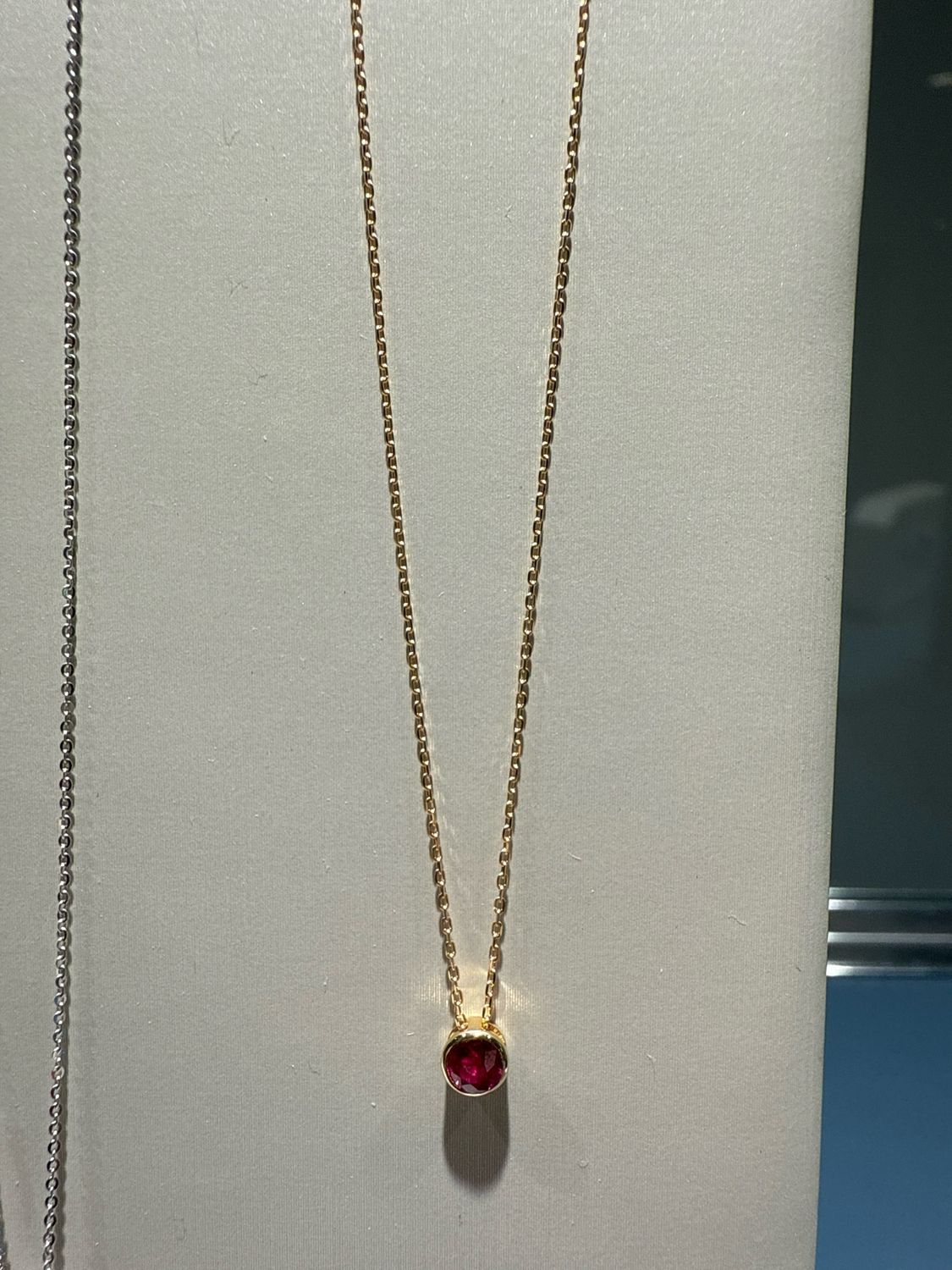18ky Ruby Bezel Set Pendant Necklace .25c