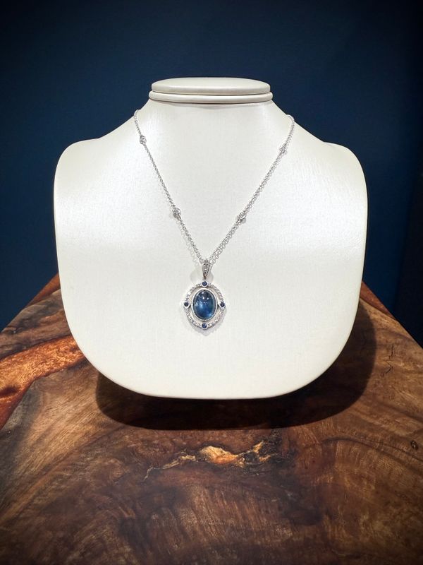 14k White Gold Custom Oval 8.55 ct Sapphire Cabochon w/ Dia and Sapp accents/ 4 Dia Bezel Stations .55ctw Dia