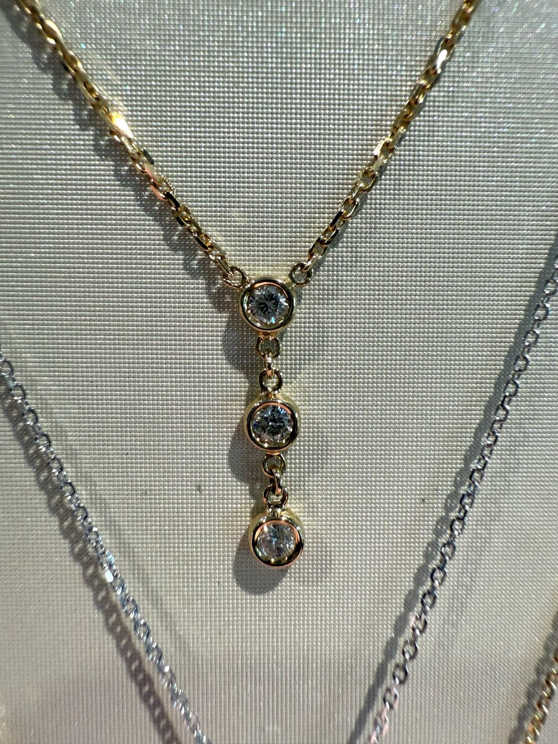 14ky Diamond Bezel 3 stone drop pendant. .15tw 16&quot;