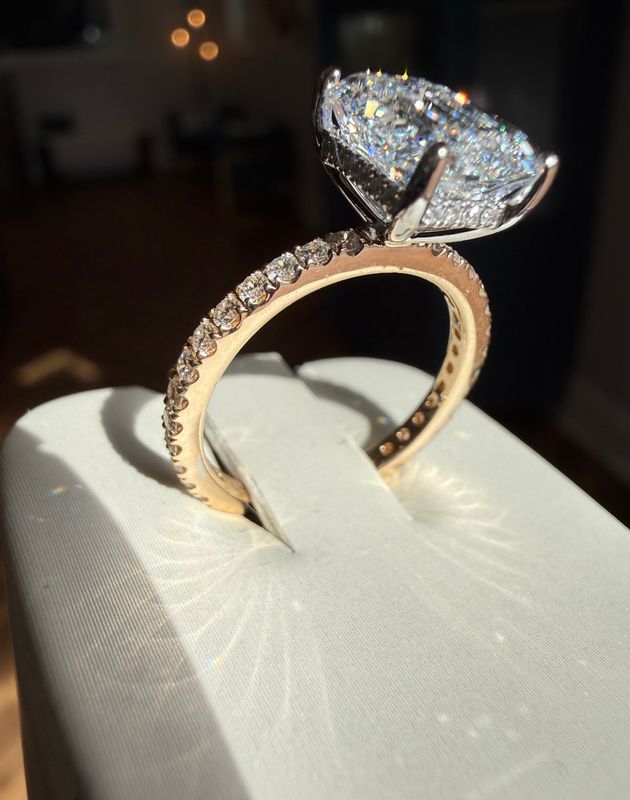2.89ct Emerald Cut Lab Grown Diamond Center Engagement ring in 14k Yellow and White Gold with Natural Diamond Shank and Hidden Halo.  0.50ctw Natural Diamonds