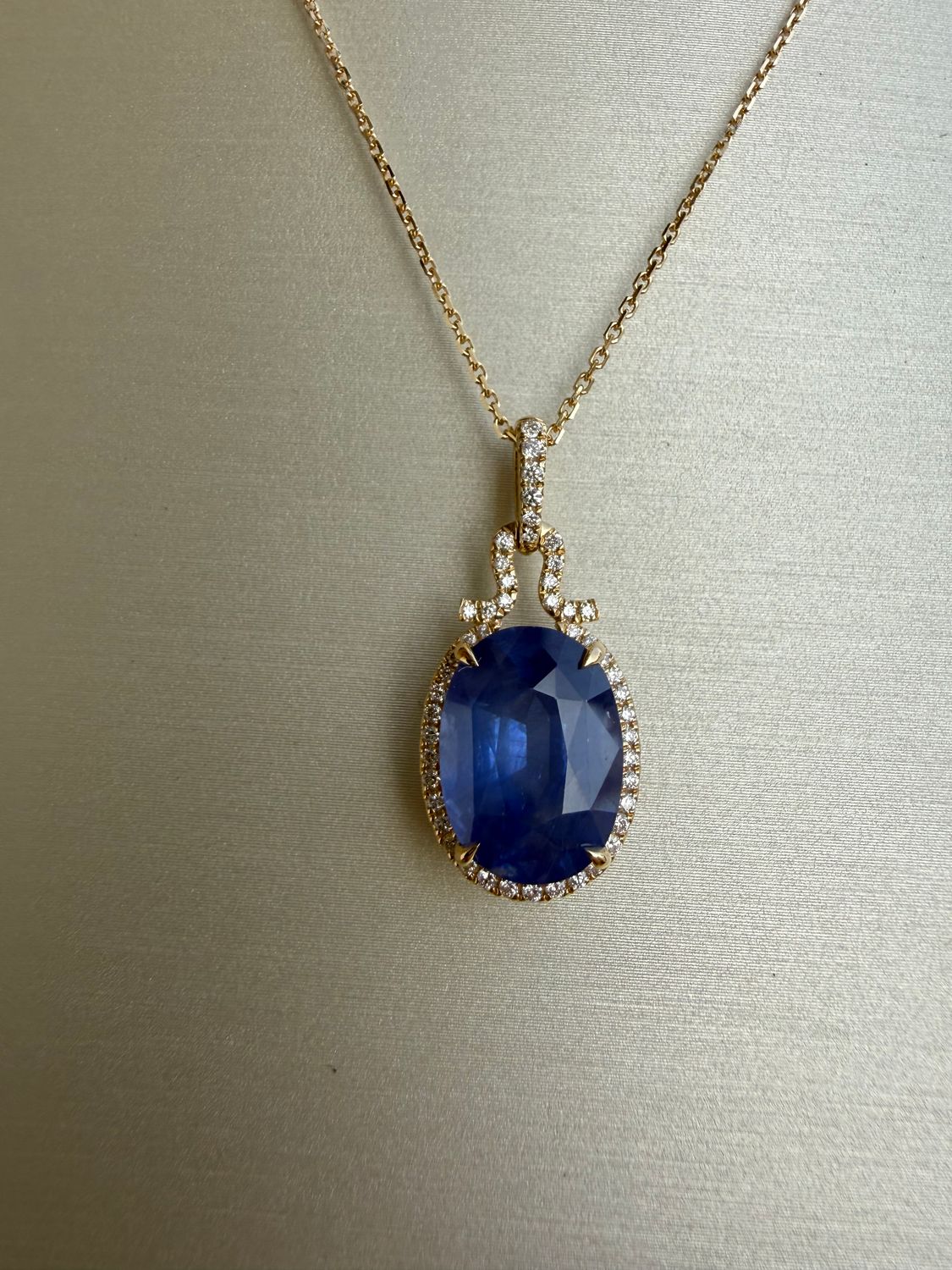 14k Yellow Gold 8.0ct Sapphire Pendant accented with 0.27ctw Diamonds 18" Adjustable Chain