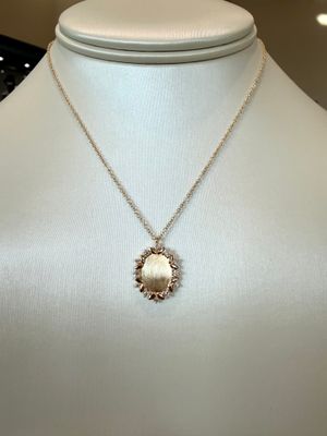 14k Yellow Gold Oval Floral and Diamond Necklace with Sandblast Finish .29ctw Diamonds