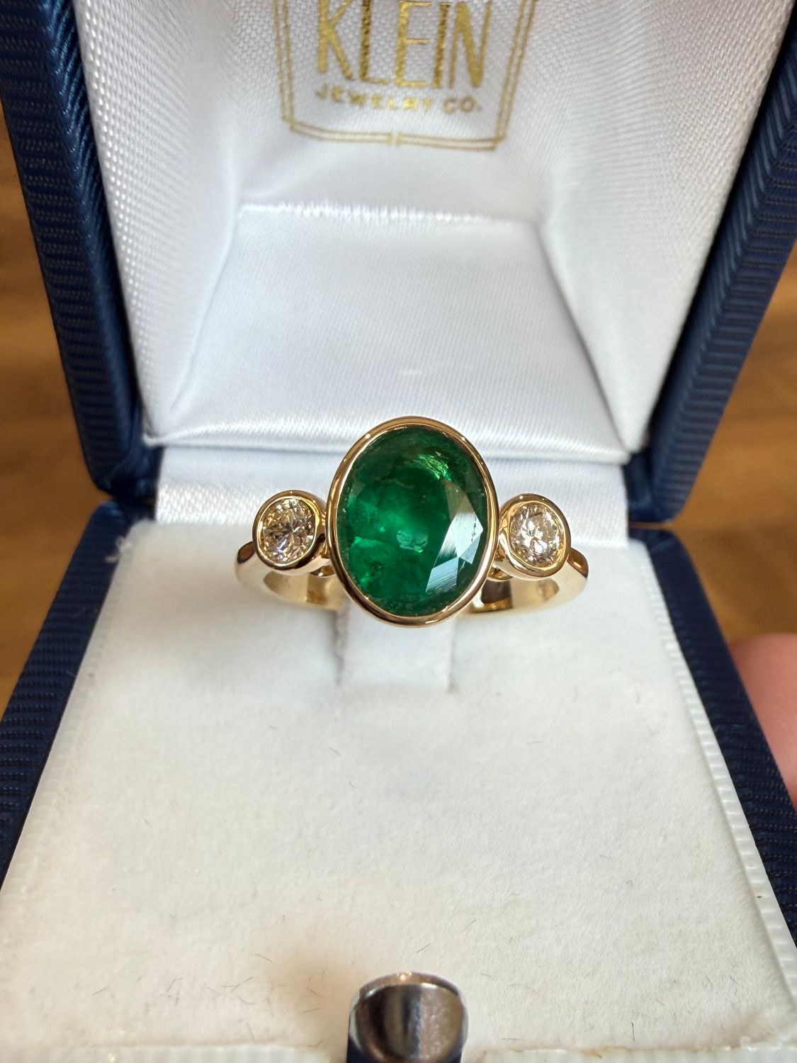 14k Yellow Gold Ring Bezel set Oval Shape Emerald and Diamond Ring: Dia .27ctw Em 1.4ctq