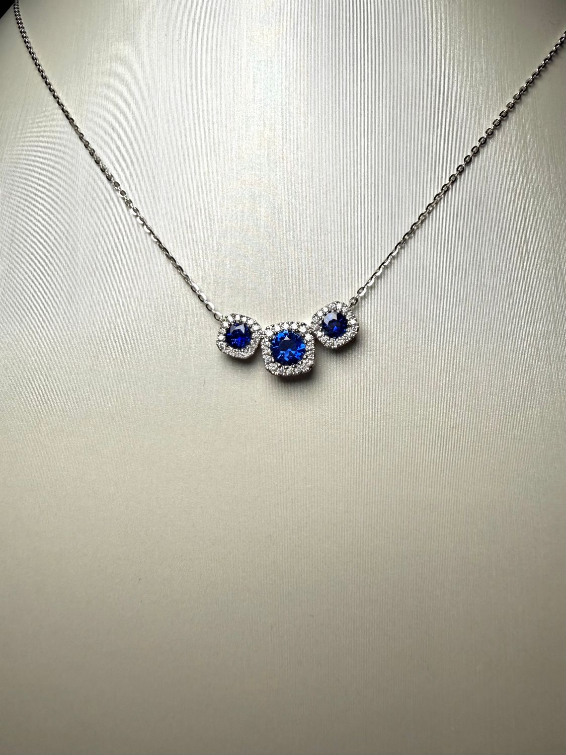 14k White Gold Necklace with .12ctw Diamond and .57ctw Sapphires