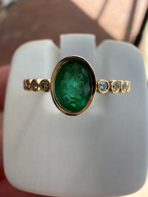 14k Yellow Gold Ring Bezel Set Oval Shape Emerald .60ct and Diamond Accents .12ctw