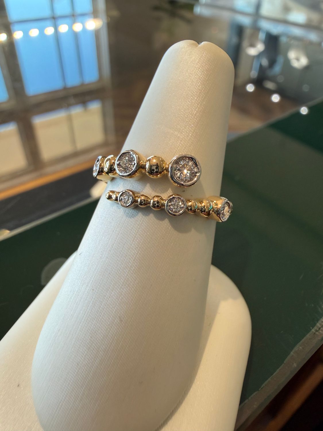 14k Yellow Gold By Pass Ring with .18ctw Bezel set Diamonds