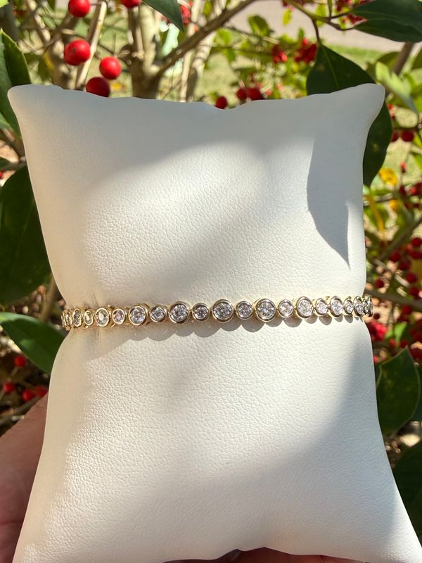 14k Yellow Gold Flex Bangle  with .70ctw Bezel Set Diamonds