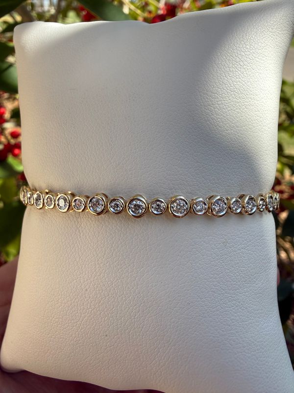 14k Yellow Gold Flex Bangle  with .70ctw Bezel Set Diamonds