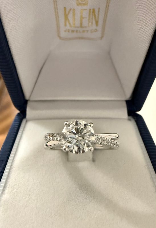 14k White Gold .90 ct GIA I VS2 Round Diamond Solitare Engagement Ring with Interlocking Shank with Diamond Accents.  1.10ctw