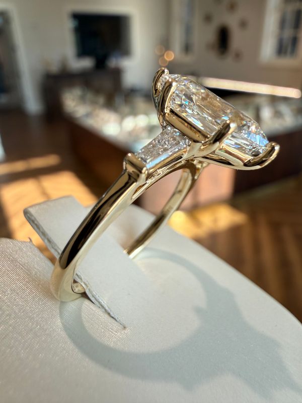 14k Yellow Gold 3.09ct Step Cut Duchess E VS1 Three-Stone Lab Diamond Engagement Ring With Tapered Baguette Diamond Side Stones 3.4ctw