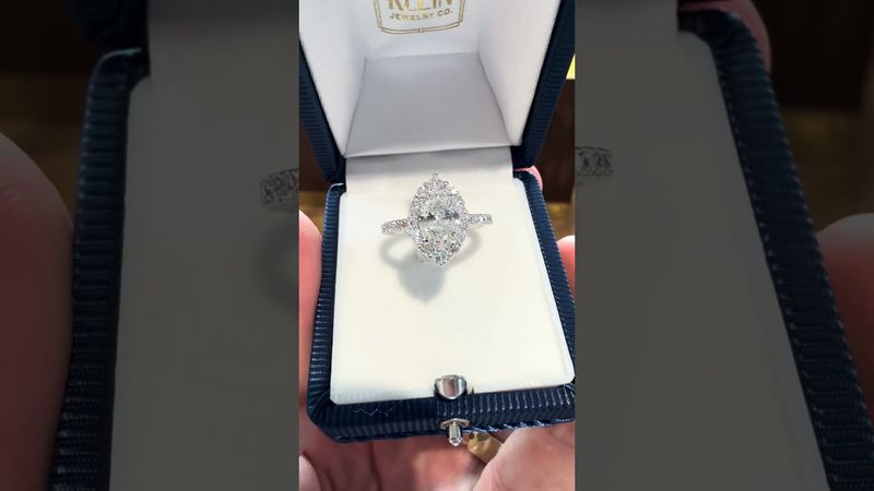 14k White Gold 1.13ct Oval Diamond Engagement Ring with Starburst Diamond Halo and Diamond Shank 1.88ctw