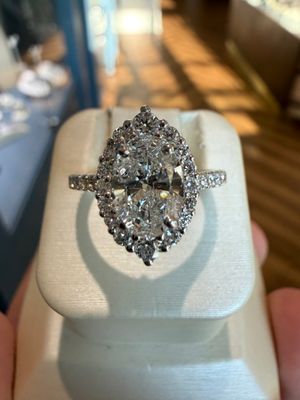 14k White Gold 1.13ct Oval Diamond Engagement Ring with Starburst Diamond Halo and Diamond Shank 1.88ctw