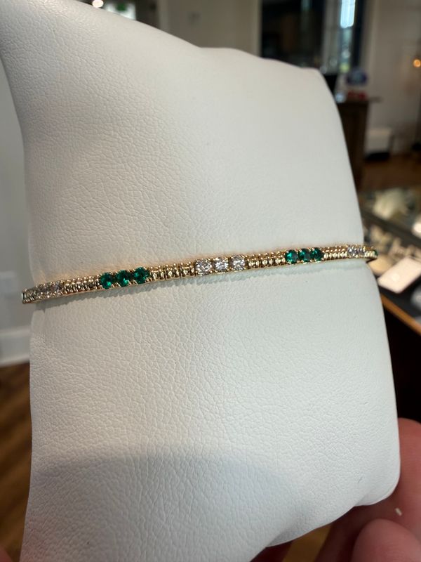 14k Yellow Gold Emerald and Diamond Flex Bangle Dia:0.51 Em:0.56