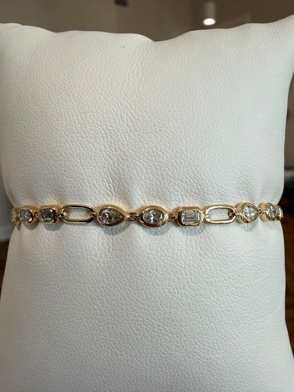 14k Yellow Gold Multi Shape Natural Diamond Bracelet with Emerald, Pear and Oval Shapes.  0.75ctw