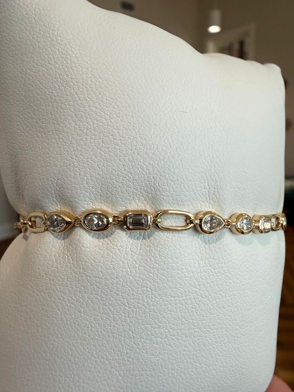 14k Yellow Gold Multi Shape Natural Diamond Bracelet with Emerald, Pear and Oval Shapes.  0.75ctw