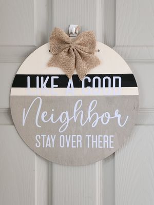 Like a good neighbor, stay over there Wood Sign